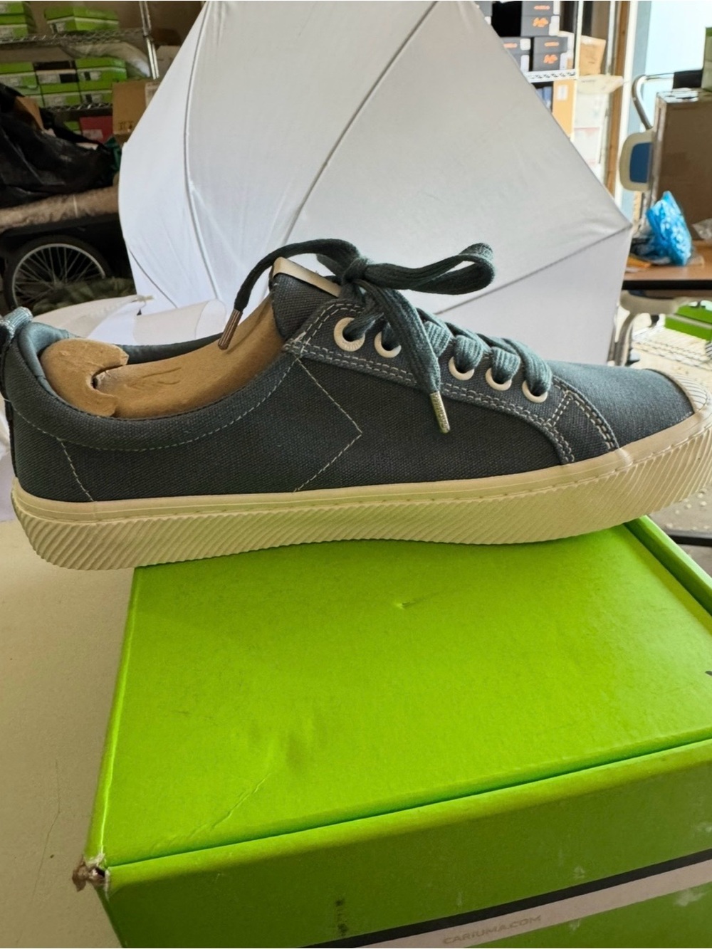 Cariuma Low-Top Sneakers in Off-White with Black Logo - Picture 3 of 10